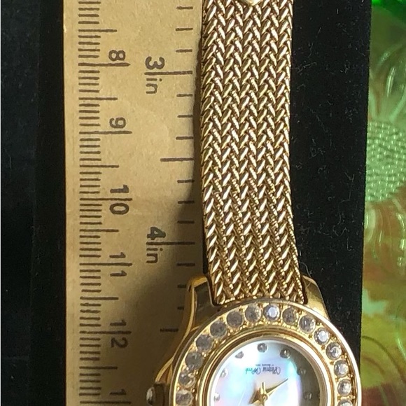 Victoria Wieck Crystal Watch Gold ToneMother of pearl face. Needs battery good C - Picture 6 of 7